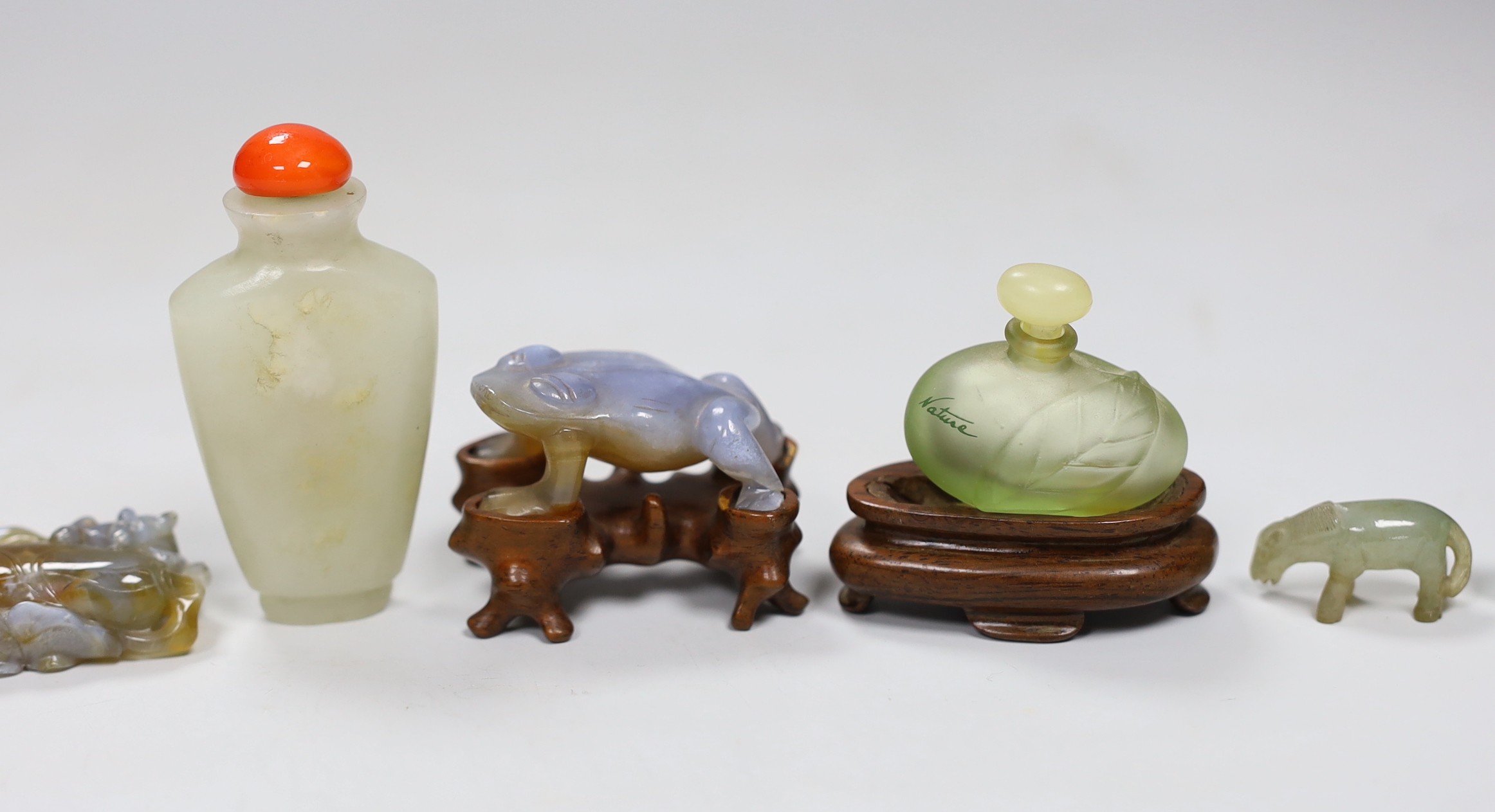 A Chinese jade snuff bottle, together with six animal hardstone figures, and a small perfume bottle